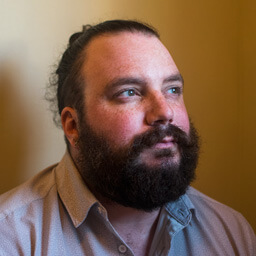 Photo of myself staring pensively off-camera, circa 2023